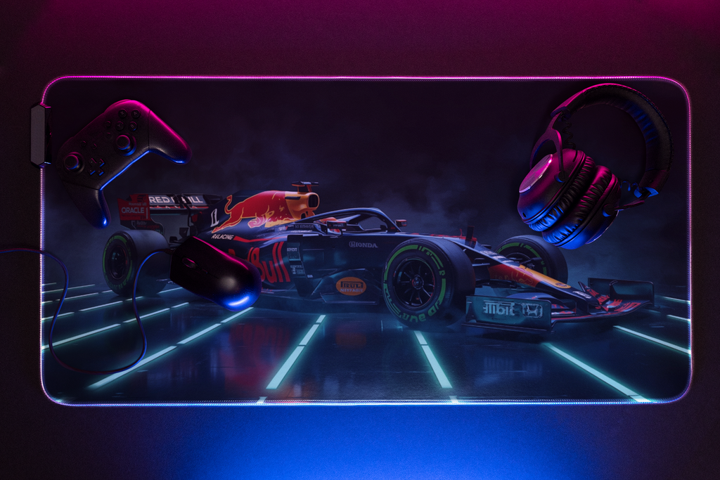 Red Bull F1 car in neon-lit environment | Desk Mat | Gaming Pad